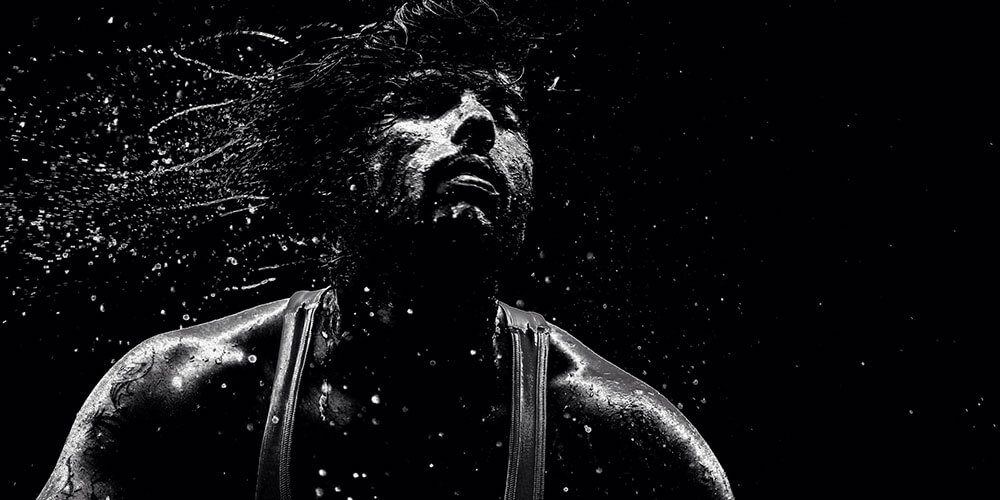 Man in black and white water motion